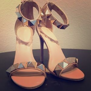 Nude and gold studded high heels